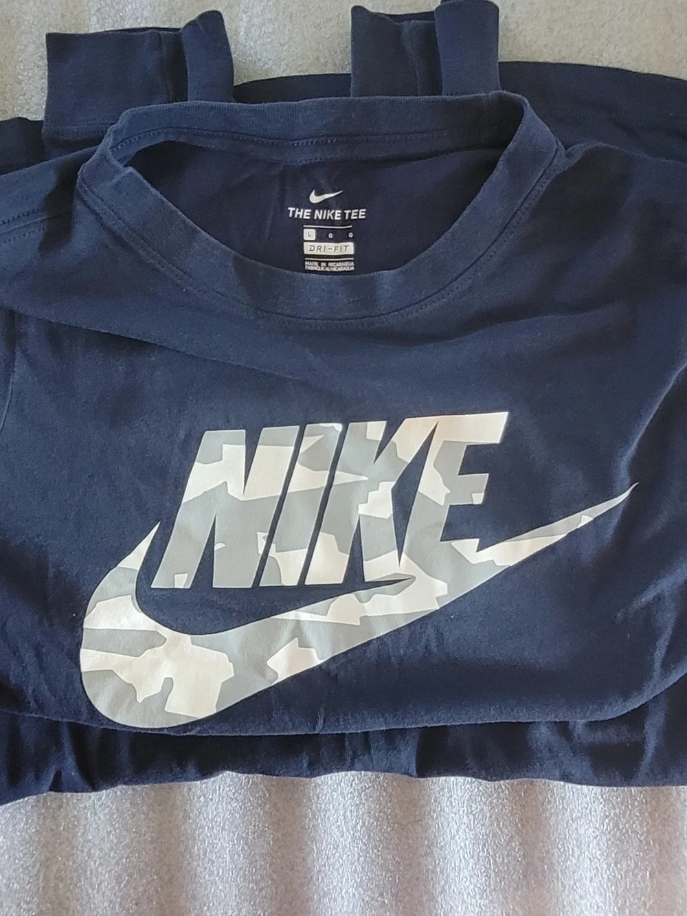 Nike Navy Short Sleeve Dri-FIT Tee with White Swoosh